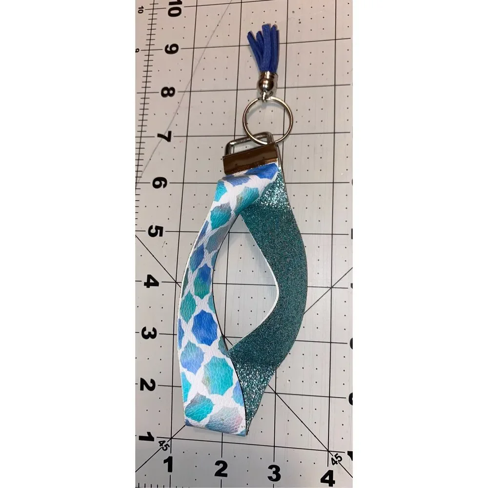 ☀️3/$9☀️ Faux Leather Keychain Wristlet with Dark Blue Tassel